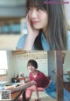 A woman sitting at a table with a bowl of food.